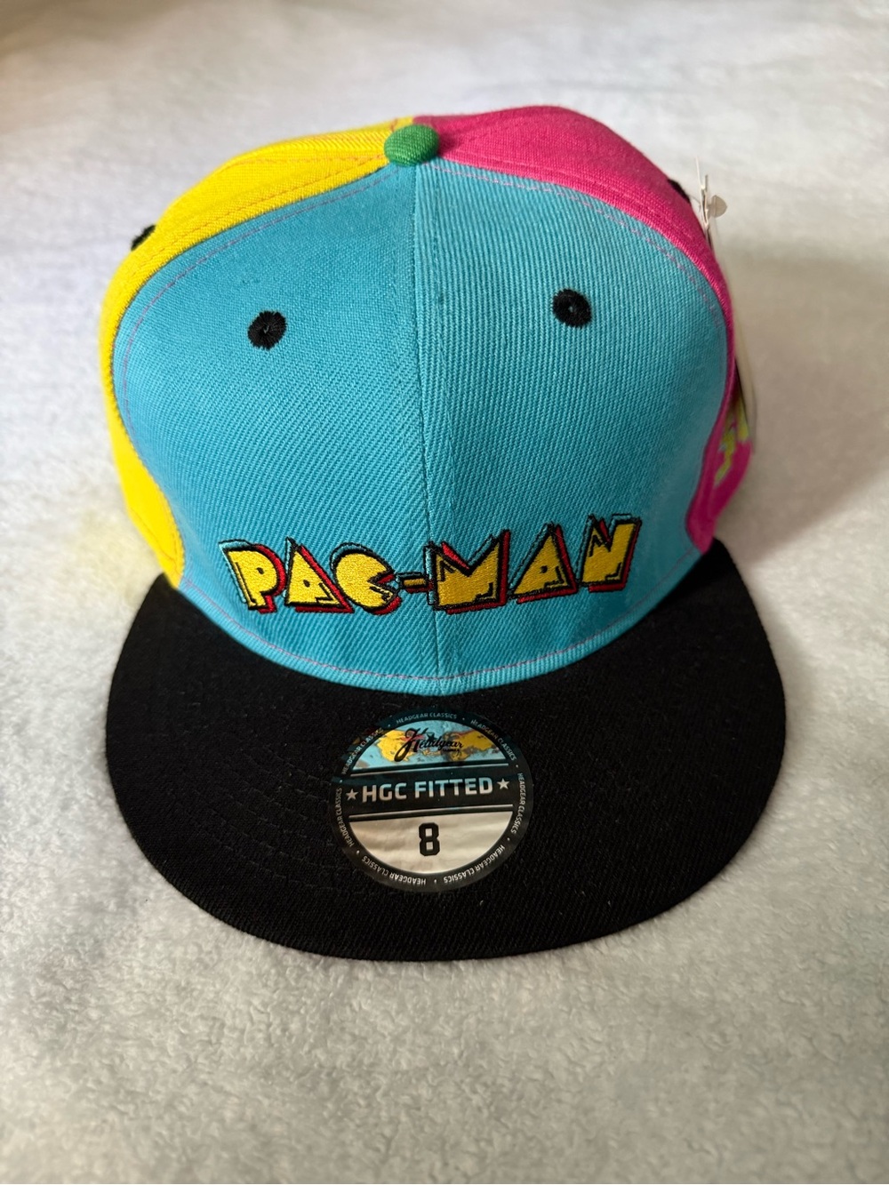Pac-Man Colorblock Fitted Cap — Multicolor (Turquoise, Pink, Yellow, Black)